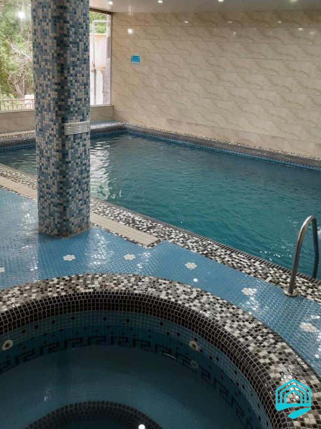 ویلای ساحلی با استخر سرپوشیده واقع در باغ بهادران